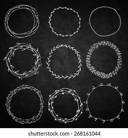 Set of decorative wreaths doodle. Nine wreaths from plants. Background chalkboard.