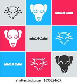 Set Deer antlers on shield, Hunting dog and Trap hunting icon. Vector
