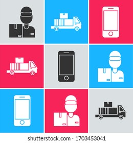 Set Delivery man with cardboard boxes , Delivery truck with cardboard boxes and Mobile phone with app delivery tracking icon. Vector