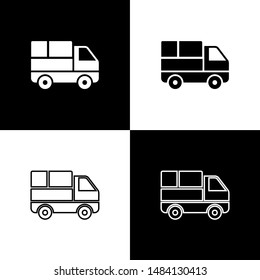 Set Delivery truck with cardboard boxes behind icon isolated on black and white background.  Vector Illustration