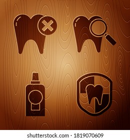 Set Dental protection, Tooth with caries, Mouthwash plastic bottle and Dental search on wooden background. Vector
