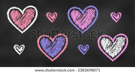 Set of Design Elements Hearts of Different Colors Isolated on Chalkboard. Realistic Chalk Drawn Sketch. Kit of Textural Crayon Drawings of Red, Pink, Violet and White Symbols of Love on Blackboard.