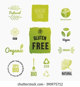 Set of design icons for organic and bio food. Raw vegan, gluten free and bio badges. Vector illustration