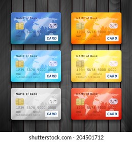 Set of detailed glossy credit cards, blue orange cyan yellow orange gold red color, vector realistic icons isolated on gray wood texture