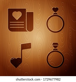 Set Diamond engagement ring, Envelope with Valentine heart, Music note, tone with hearts and Wedding rings on wooden background. Vector