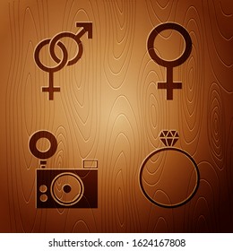 Set Diamond engagement ring, Gender, Photo camera and Female gender symbol on wooden background. Vector