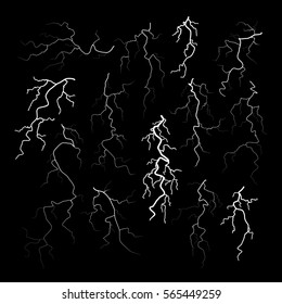 Set of different black cracks isolated on black background. Set of simple lightning bolts. Vector illustration for your graphic design.