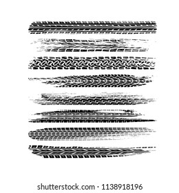 Set of different black tire tracks isolated on white background