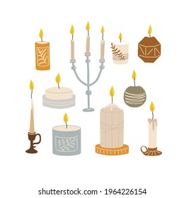 Set of different candles and candlesticks