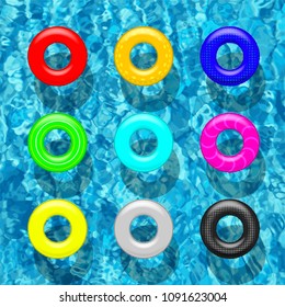 Set of different color swimming rings on blue pool water background. Vector design elements.