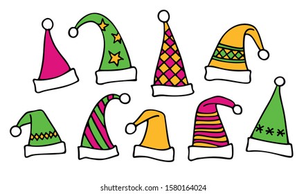 Set of different colorful Santa Claus hats isolated on white background