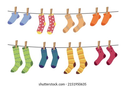 Set of different colorful socks hanging on the rope. Cotton or wool socks dry and hang on laundry string with clothespins. Vector illustration