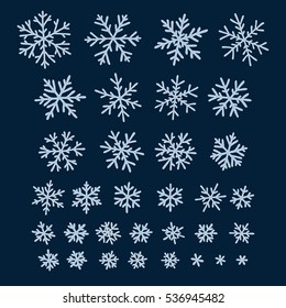 Set of different doodle  hand-drawn snowflakes