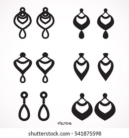 set of different earrings isolated on white