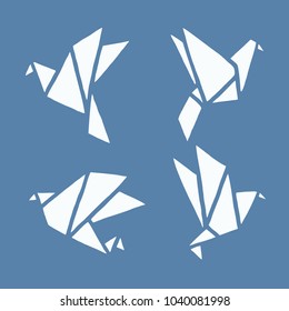 Set of different freehand drawn cartoon paper origami birds made in kid childish style. Vector illustration. 