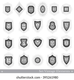 Set of different geometric shields with light ray. Hipster style templates with numbers