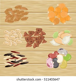 A set of the different grains and seeds located on a wooden board