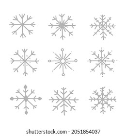 Set of different hand draw icons or symbols of snowflakes. Vector illustration isolated on background.