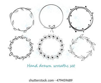 set of different hand drawn wreaths. hand drawn floral frames, vector design elements