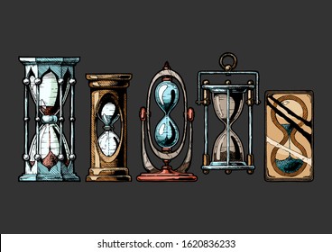 Set of different hourglass in old fashioned etched style. Vector illustration Isolated on black background. 