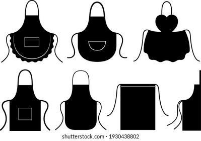 Set of different kitchen aprons isolated on white