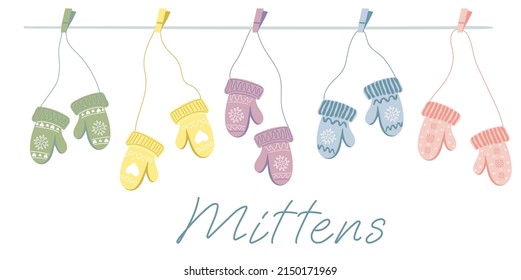 Set of different knitted mittens hanging on the rope. Cute hand drawn elements for winter design. Winter clothes. Vector illustration.