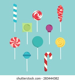 Set of different lollipops on a blue background.