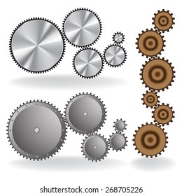 Set of different metal gears on a white background