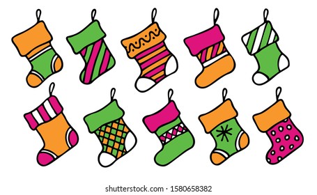 Set of different multi-colored decorative Christmas socks isolated on white background