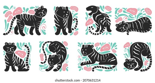Set of different posed stylized vector tigers. Floral and nature elements round. Stamp and print design, logo or stickers elements.