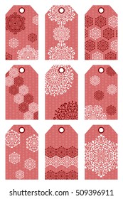 Set of different red Christmas tags with snowflakes for gifts