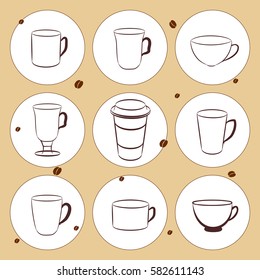 A set of different shape cups on brown background with coffee