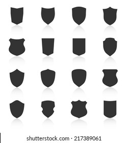 Set of different shield shapes icons with reflection. Vector illustration