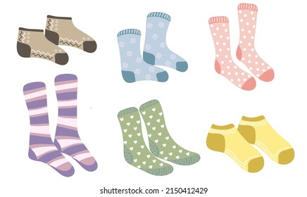Set of different socks.Warm woolen and cotton socks with cute patterns. Vector illustration