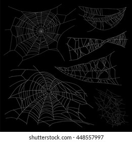 Set of different spiderwebs on a black background. Vector illustration. Elements for design.