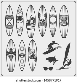 Set of different surfboards. Vector illustration. Surfing emblems, icons and labels.