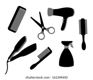 set of different tools for hair care on a white background