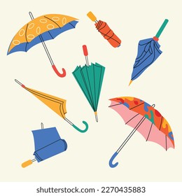 Set of different umbrellas in different positions. Open and folded umbrellas. Bright colors. Hand drawn color vector illustration. Cartoon style. Design templates. All elements are insulated