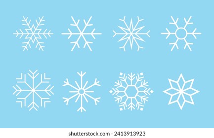 A set of different white snowflakes on a blue background.