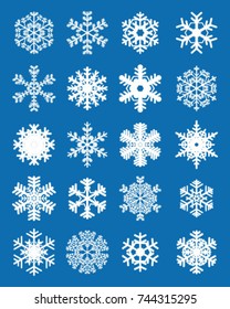 Set of different white snowflakes on a blue background