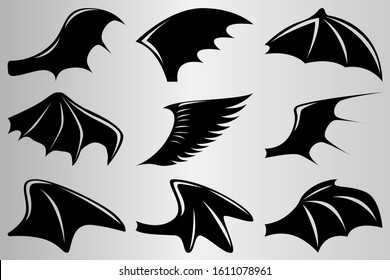 Set of different wings, demons and bats . The silhouette of the wings. Drawing for tattoo. Vector illustration.