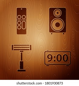 Set Digital alarm clock , Remote control , Electric heater  and Stereo speaker  on wooden background. Vector