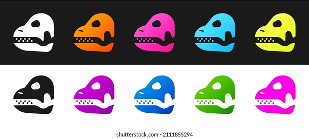 Set Dinosaur skull icon isolated on black and white background.  Vector