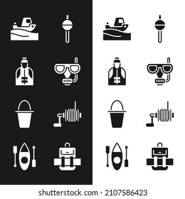 Set Diving mask and snorkel, Fisherman, Fishing boat on water, float, bucket, Spinning reel for fishing, Hiking backpack and Kayak canoe icon. Vector