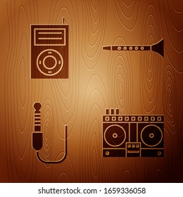 Set DJ remote for playing and mixing music, Music MP3 player, Audio jack and Clarinet on wooden background. Vector