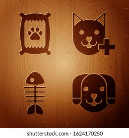 Set Dog, Bag of food for dog, Fish skeleton and Veterinary clinic symbol on wooden background. Vector
