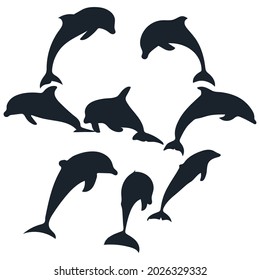 Set of dolphins silhouette on white background