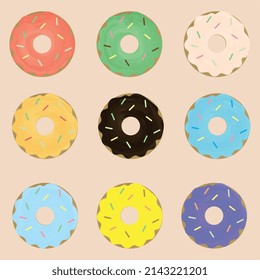 a set of donuts covered with colored glaze