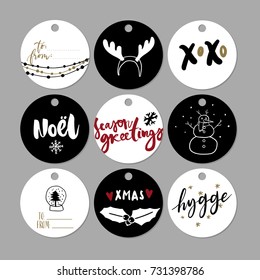 Set of doodle Christmas gift tags. Vector hand drawn cute icons. Scandinavian style printable. Xmas tree, house, garland, snowman, deer horn, lettering. New Year scrapbook. Holiday festive party.