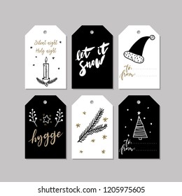 Set of doodle Christmas greeting tag. Vector hand drawn cute icons. Scandinavian style. Xmas tree, candle, hygge, santa hat and lettering. New Year scrapbooking. Holiday festive party.